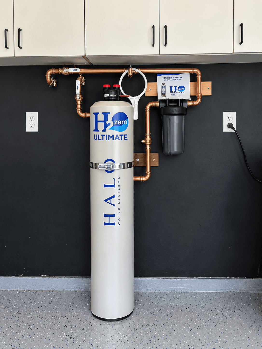 HALO H2Zero whole-home water treatment system installed with copper piping and filter housing