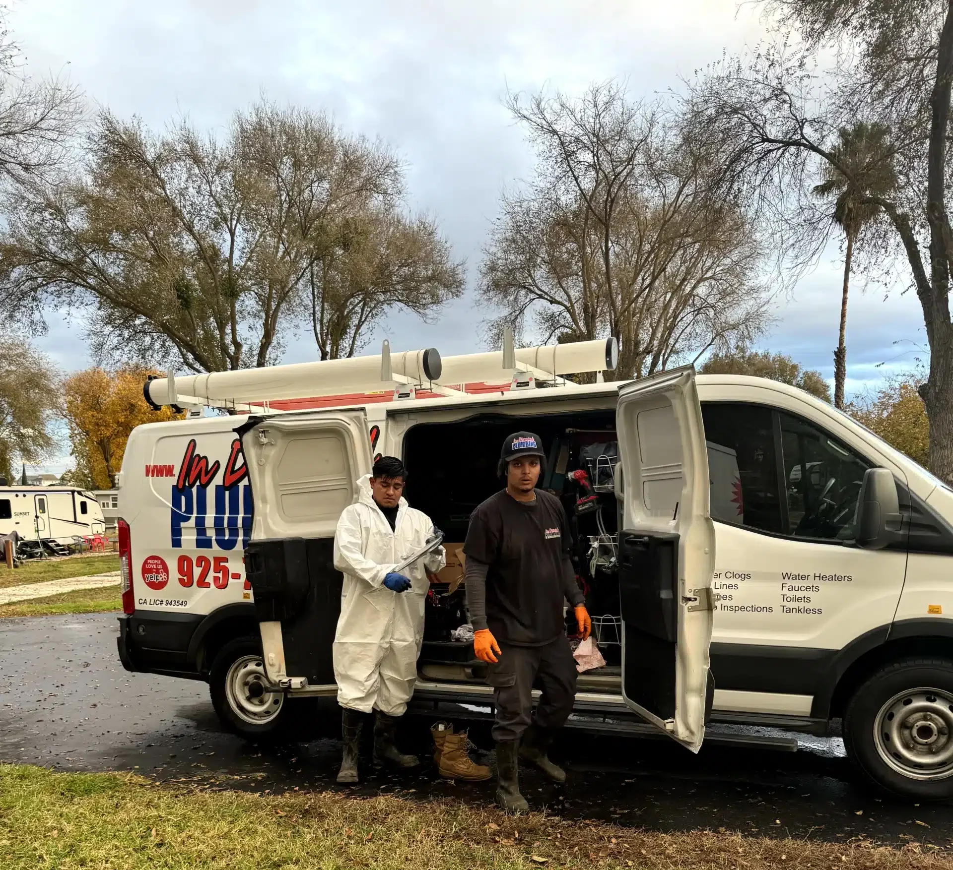 In demand Plumbing crew getting out of van in Antioch, CA.