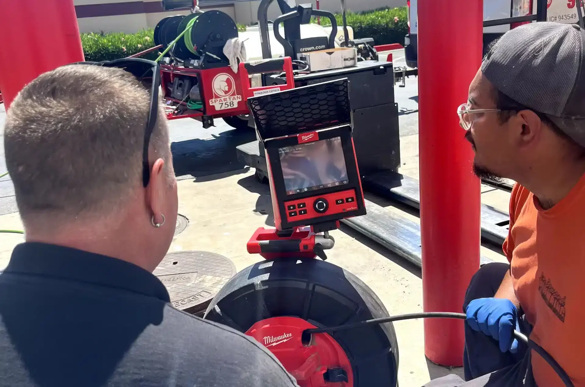 Techs performing video camera inspection in sewer line on commercial property in Antioch, CA.
