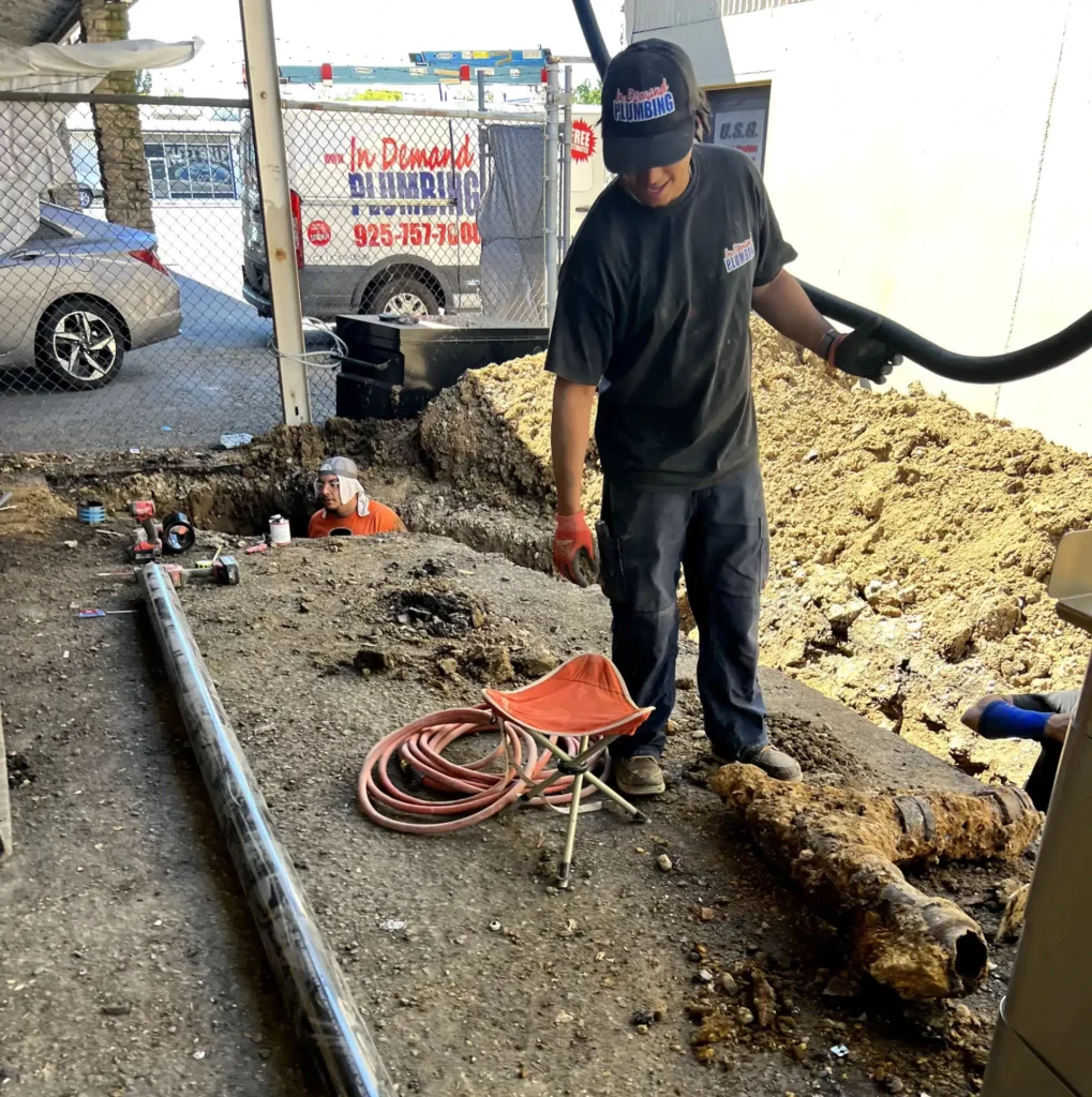 tech replacing sewer line in Antioch, CA.