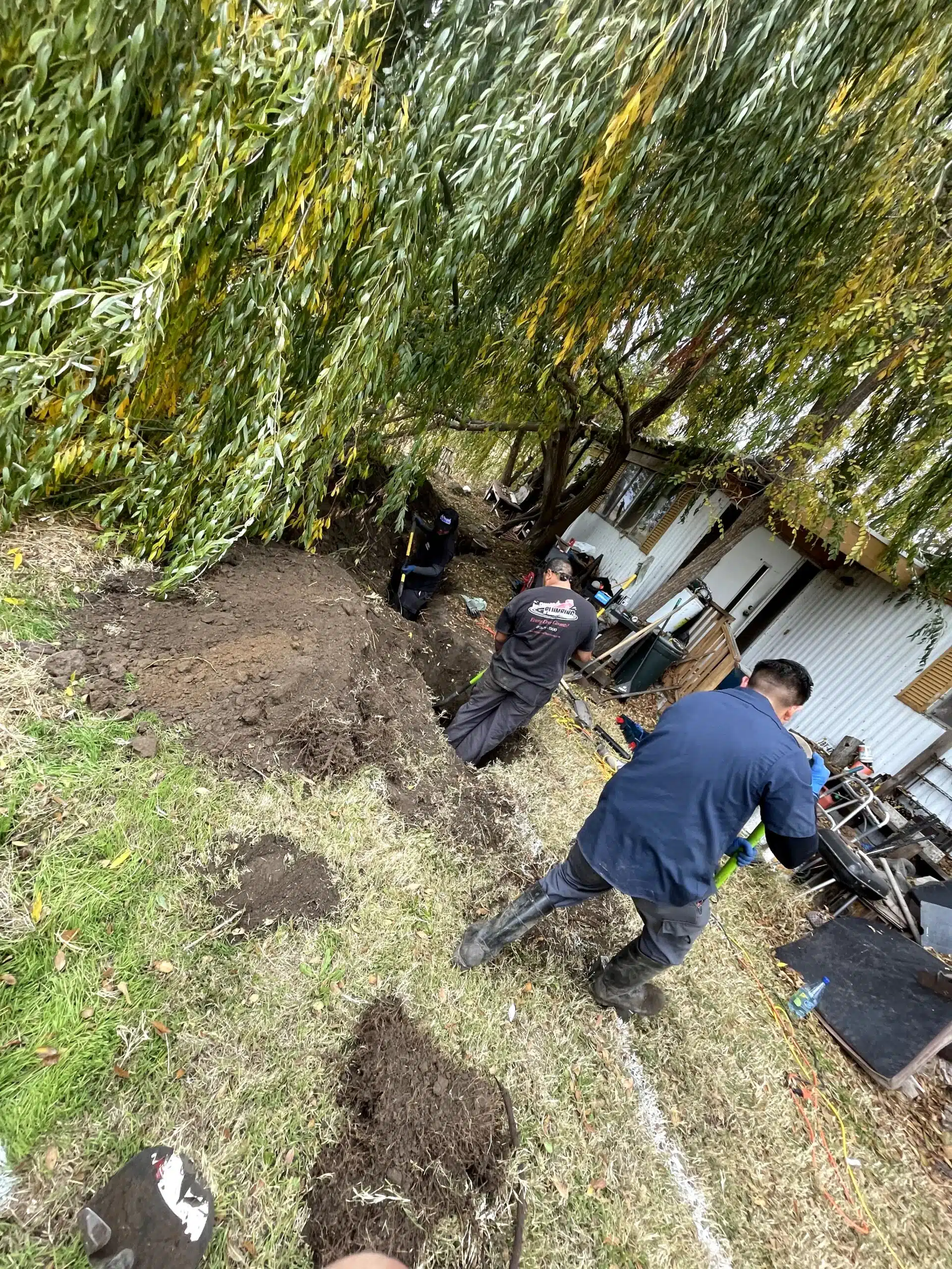 Techs digging up sewer line in Antioch, CA.